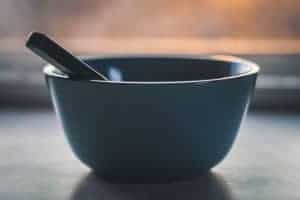 An empty dark blue bowl